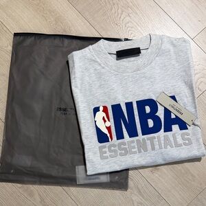 Fear of God Essentials x NBA Light Heath T-Shirt